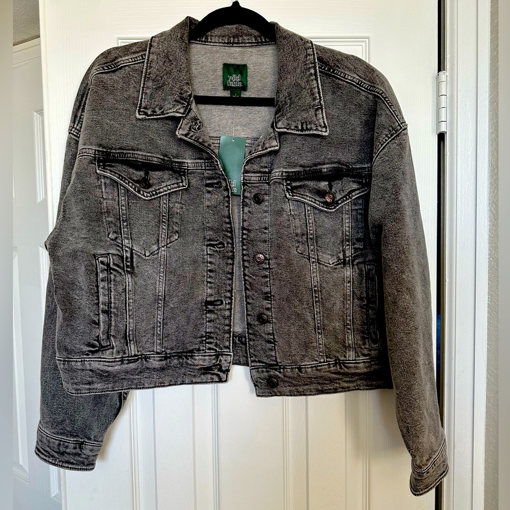 Grey/black oversized, cropped jean jacket. Size large. NEVER WORN w/TAGs.